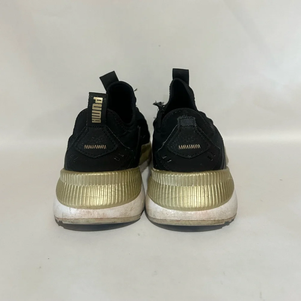 Puma Women’s Black and Gold Athletic Shoes